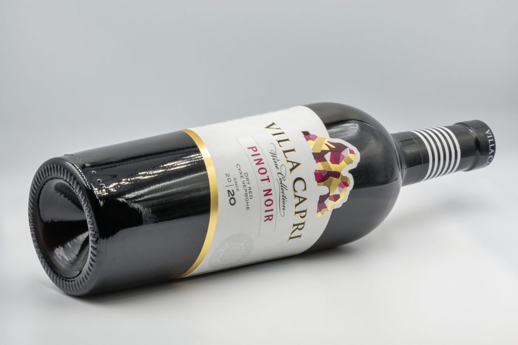 wine bottle laying on its side clearly showing it's front label